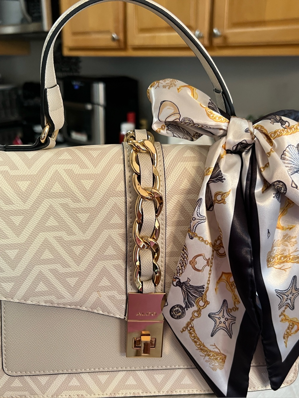Aldo Cream Shoulder Bag with Gold Chain and Printed Scarf